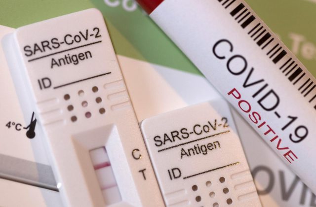 FILE PHOTO: Rapid SARS-CoV-2 Antigen Test kits are seen in this illustration taken, January 13, 2022. REUTERS/Dado Ruvic
